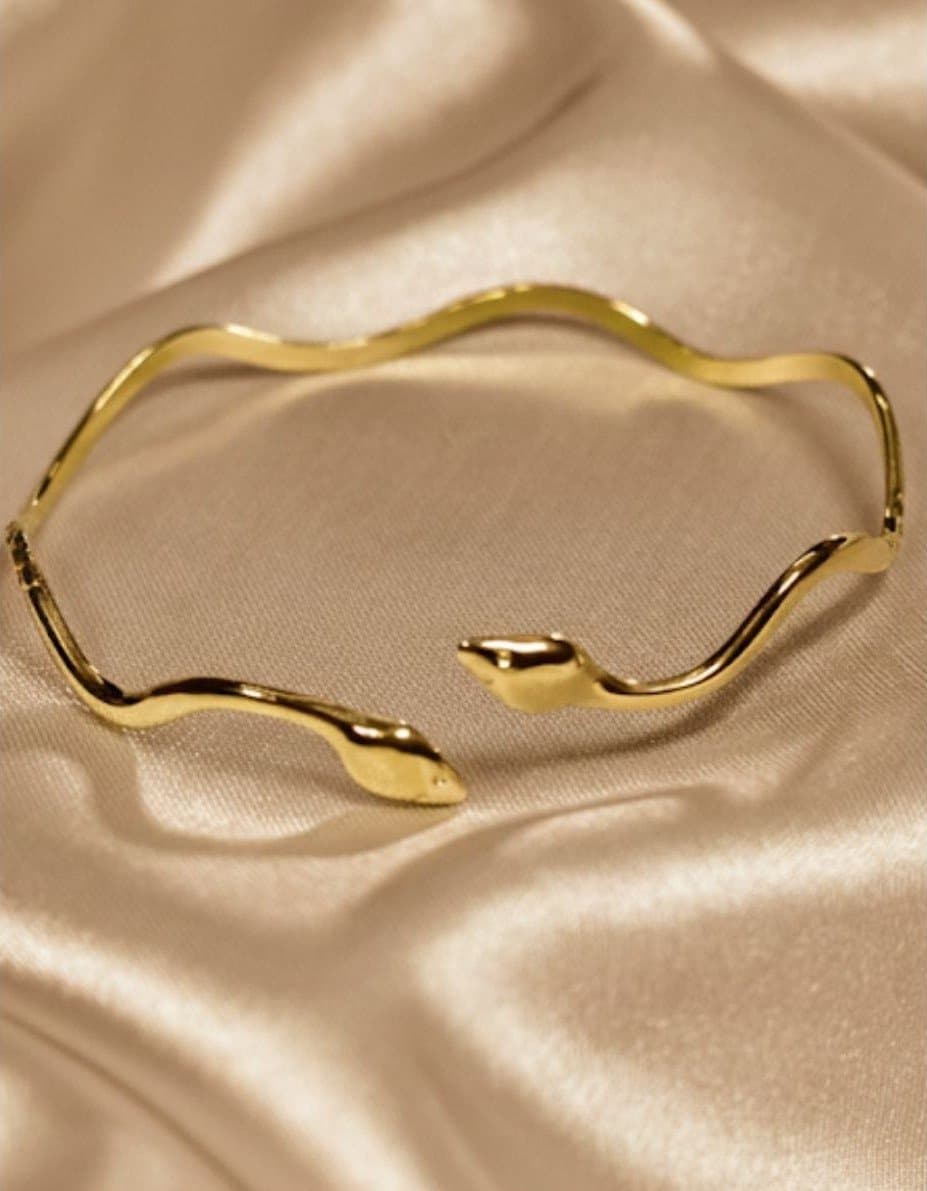Golden snake motif bangle bracelet