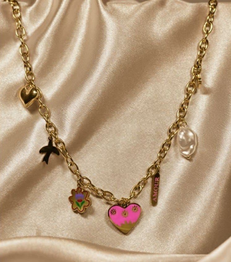 Golden chain necklace with amore charms